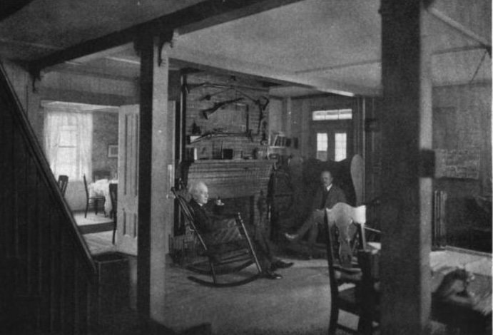 photo shows a couple sitting in the sitting room of the inn. 