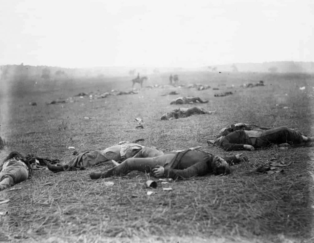 photo shows deceased soldiers laying in the gettysburg battlefield