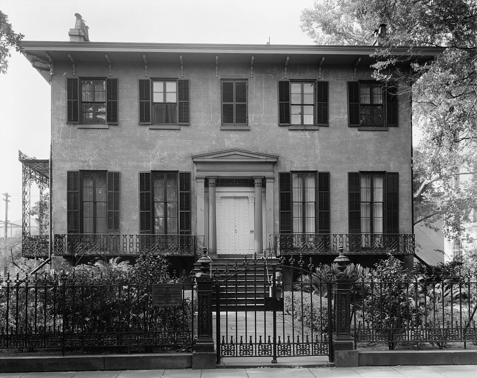photo shows the facade of the andrew low house in black and white. 