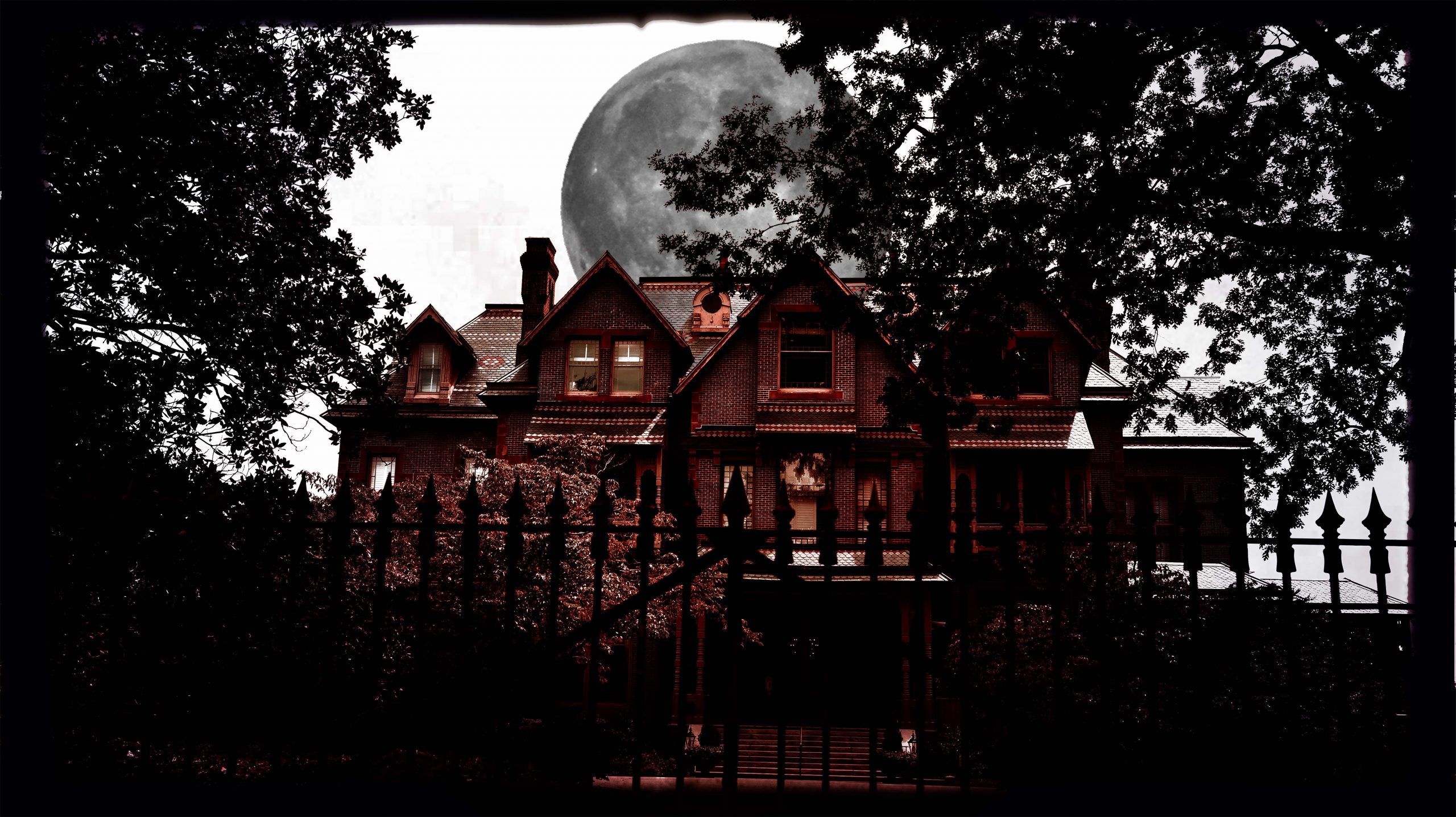 The Executive Mansion at night underneath a full moon, haunted site in Raleigh, NC and on the Raleigh Ghosts Haunted Tour.