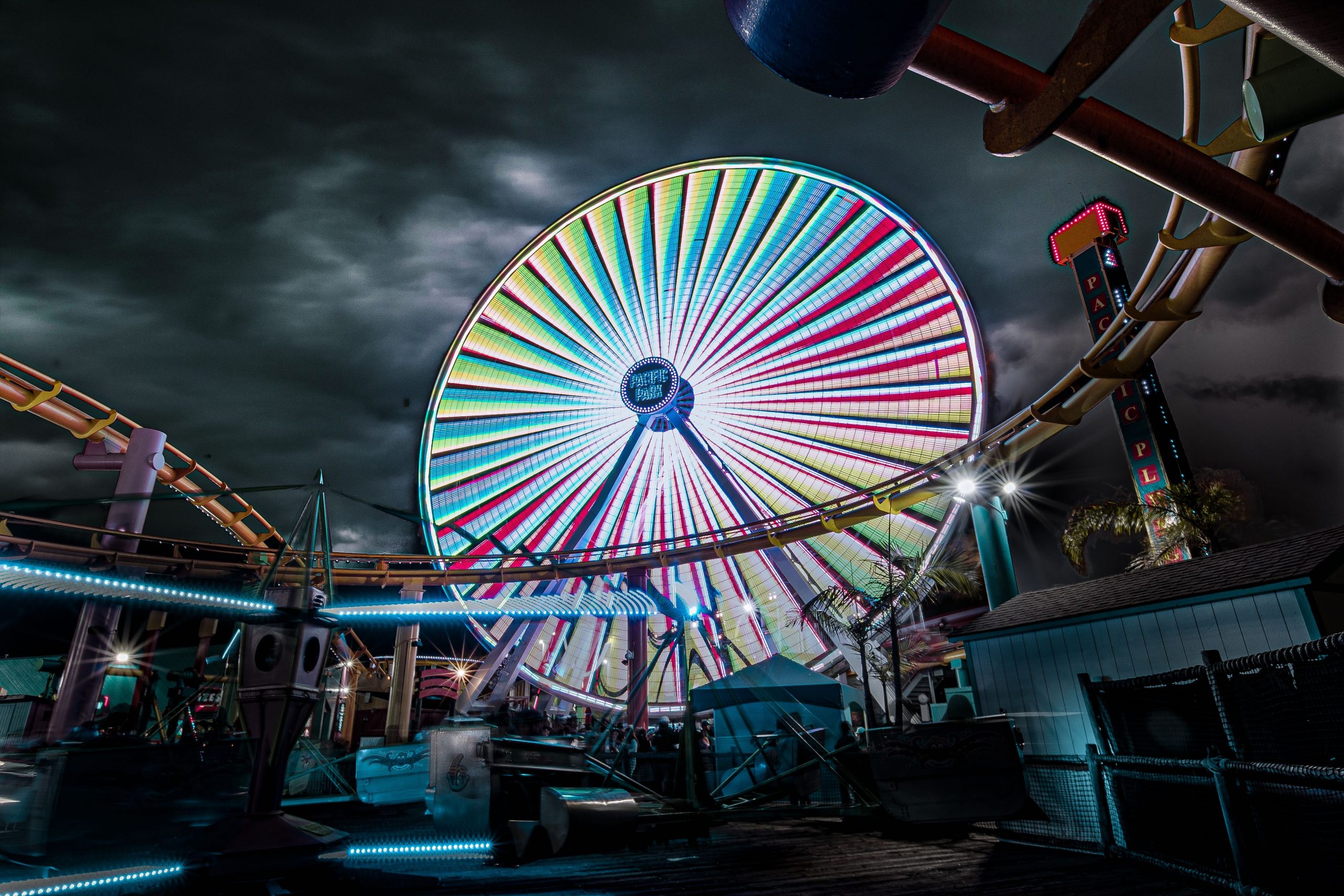 The Pacific Wheel lit up at night on the Santa Monica Pier