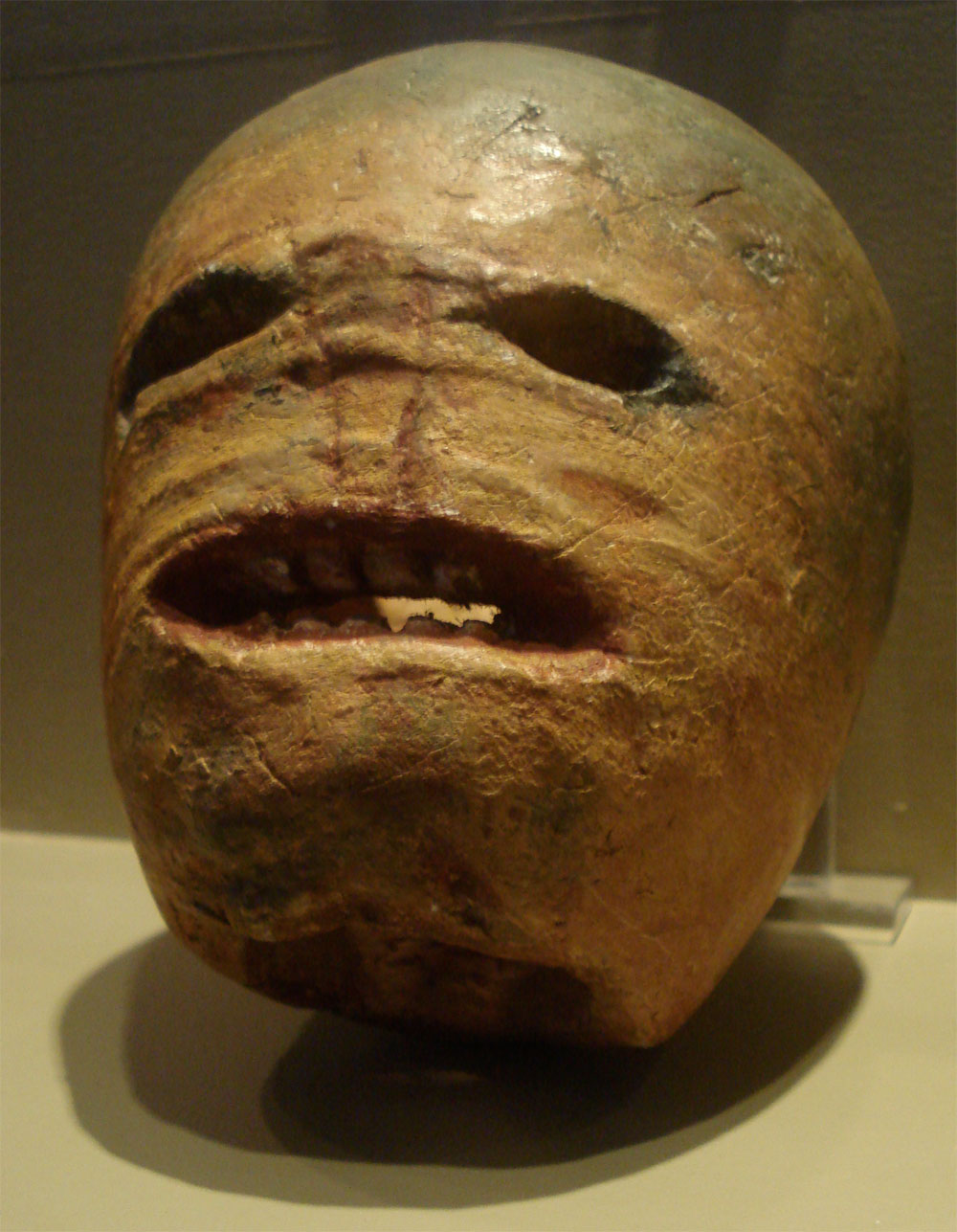 Historic Roots of Halloween. photo shows an old carved turnip 