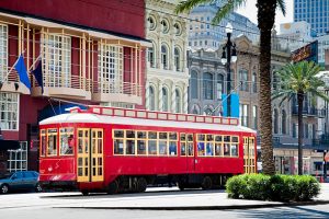Hilton Riverside. photo shows an old time street car in new orleans