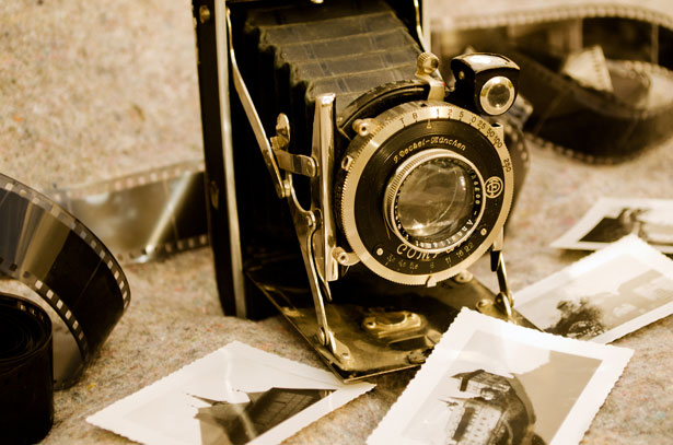 photo shows an old film camera on a table