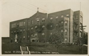 photo shows a black and white image of the St. Ignatius hospital in the 1930s