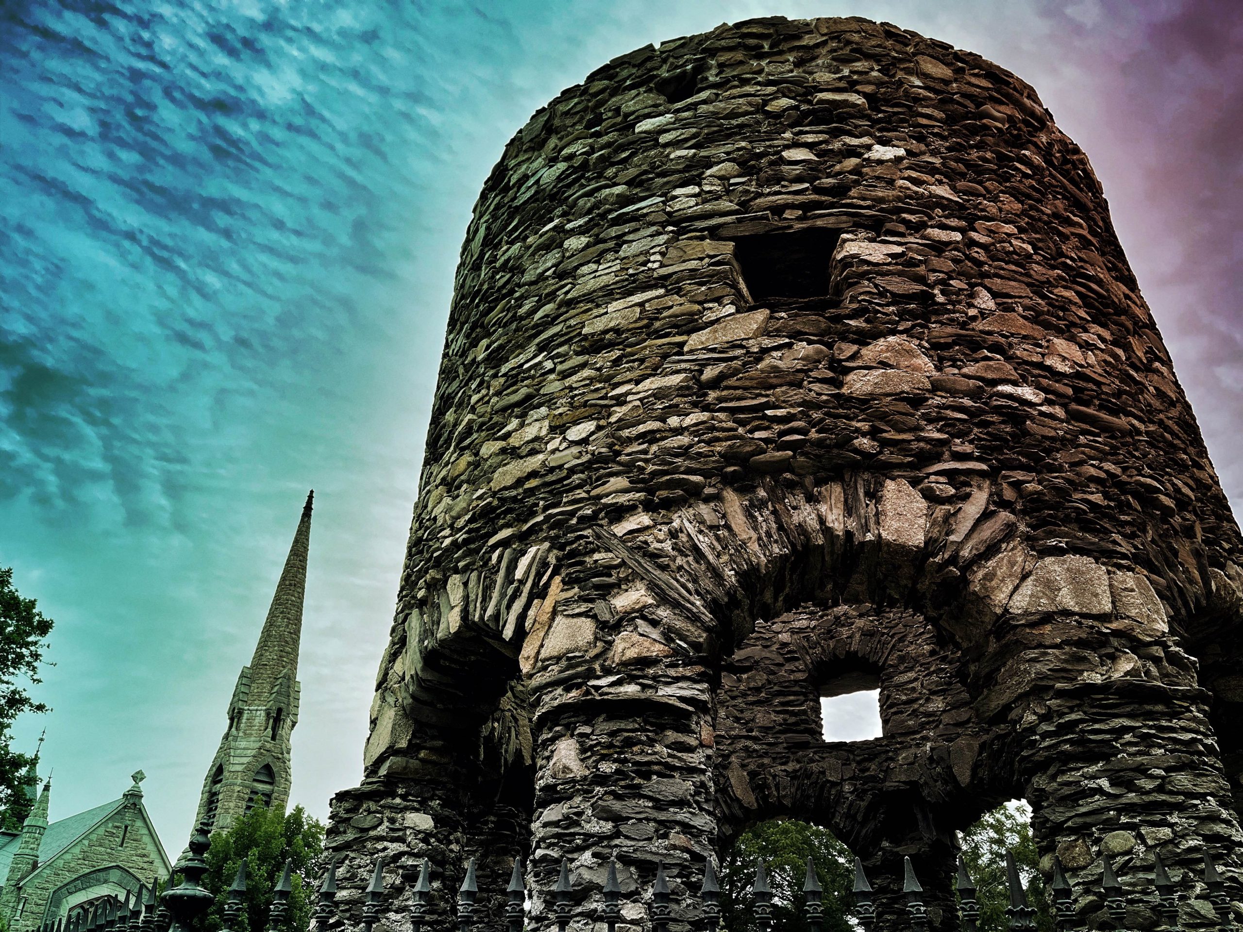 Upward Angle Spooky Photograph of The Haunted Newport Tower Stone Mill in Newport, RI, haunted location for the Newport Ghosts Haunted Tour