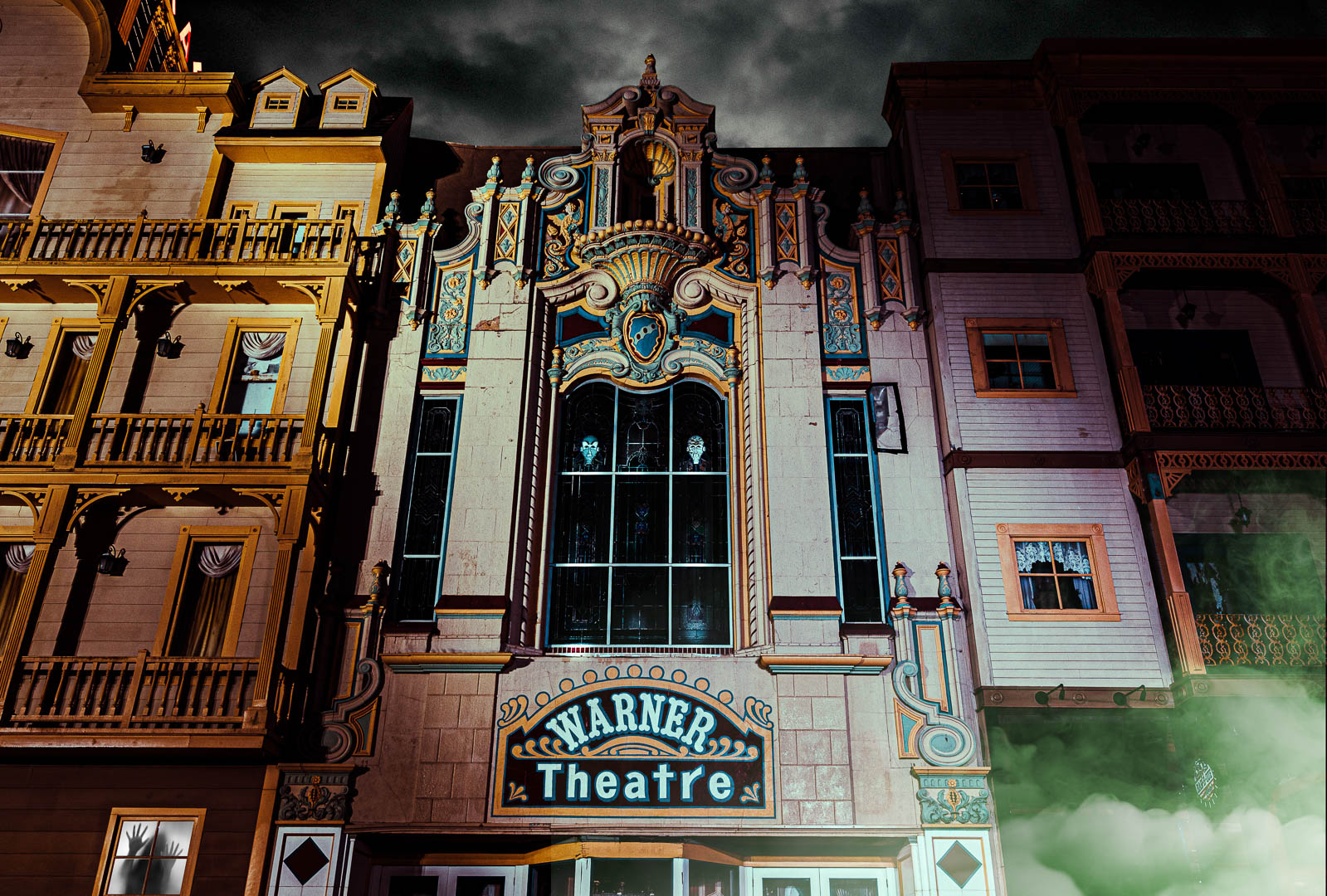 Nighttime Photo of Haunted Warner Theatre with fog in Atlantic City, NJ on the Atlantic City Ghosts Tour.