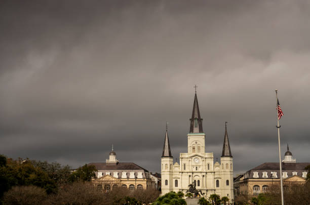 A stormy skyline above a cathedral and two neo classical buildings