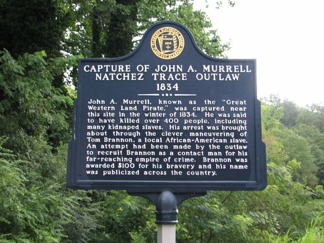 A historical sign denoting the sight of the capture of John Murell
