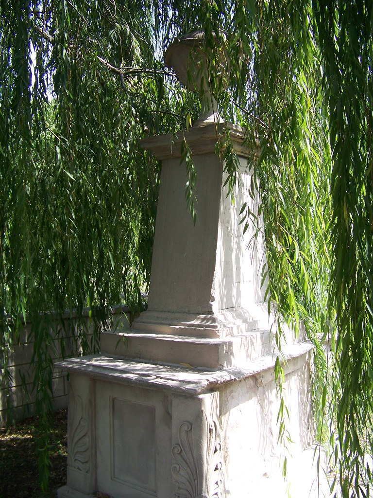 A tomb hidden under a willow tree