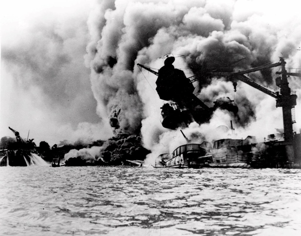 photo shows huge smoke plumes at pearl harbor after the attack