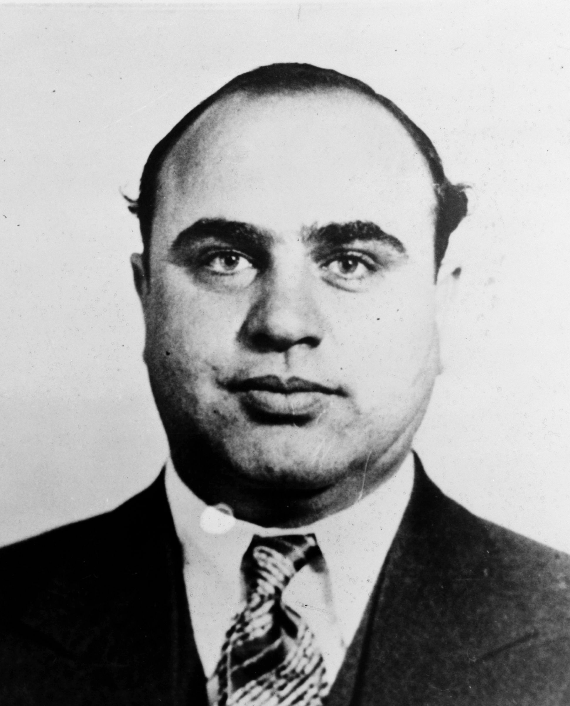 A black and white mug shot of famous gangster Al Capone