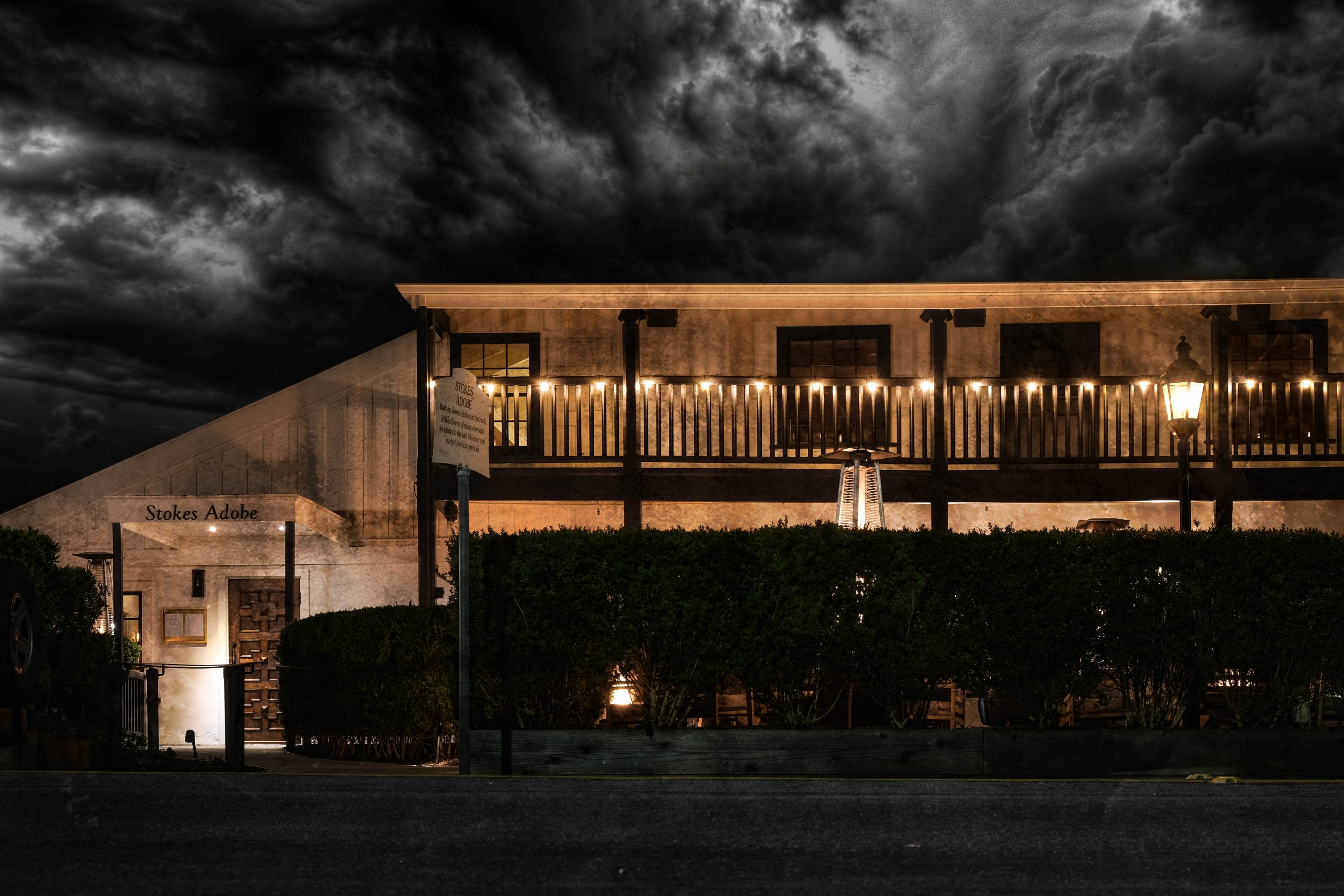 Street view of the Stokes Adobe in Monterey, CA at night